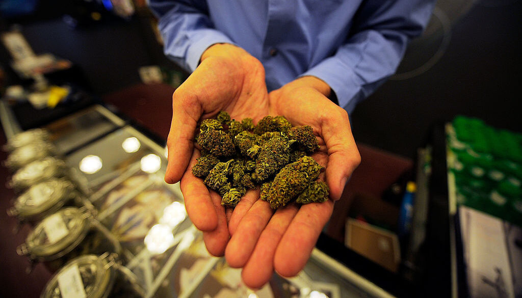Interior of a modern cannabis dispensary with a diverse product selection